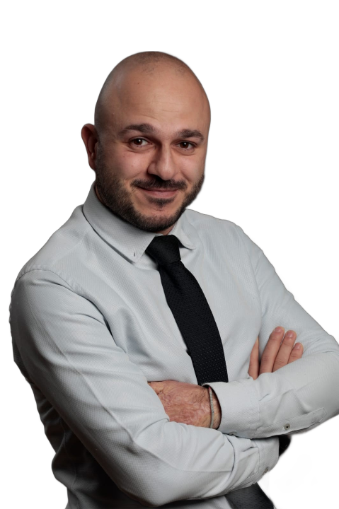 Portrait of Issa Moussallem, CEO of Emploviders, standing confidently in a professional setting